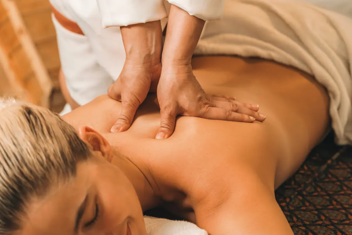 A person getting a massage from someone else